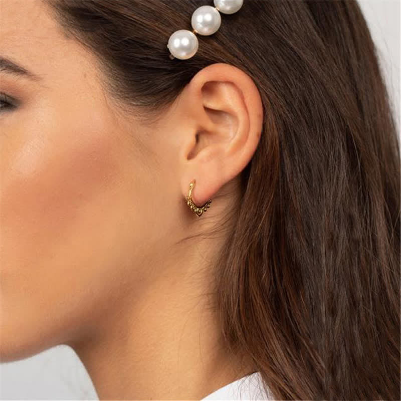 Boucles d'oreilles créoles porte-bonheur en cuivre et fleur de lotus