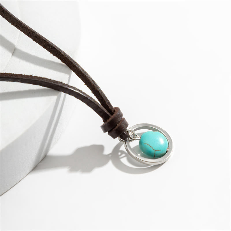 Collier pendentif rond turquoise avec symbole de force de protection