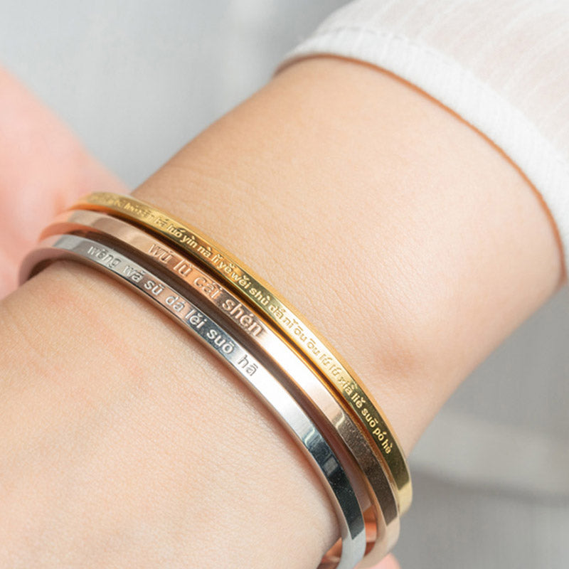 Bracelet Om Mani Padme Hum en acier titane avec six mots vrais