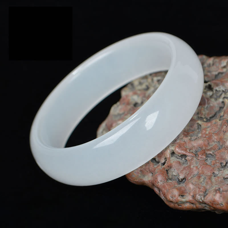 Bracelet jonc en jade et soie dorée 58 mm pour la richesse et la chance