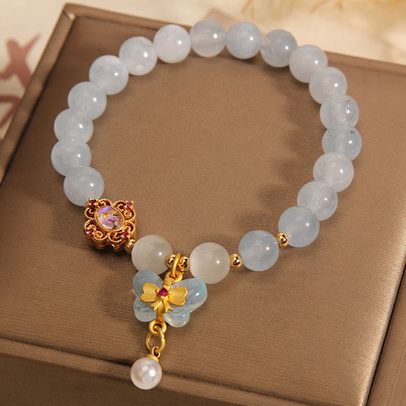 Bracelet aigue-marine avec œil de chat et perle papillon pour la guérison