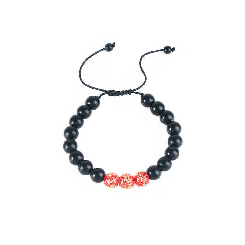 Bracelet de force en obsidienne noire de 10 mm avec pierre lumineuse
