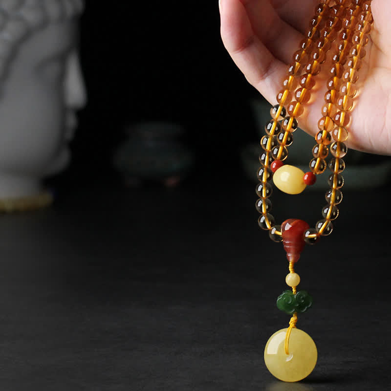 Bracelet Mala 108 perles en citrine et ambre pour la paix