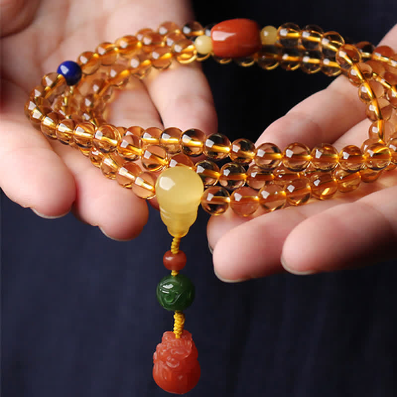 Bracelet Mala 108 perles en citrine et ambre pour la paix