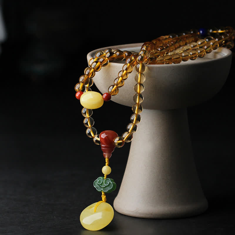Bracelet Mala 108 perles en citrine et ambre pour la paix