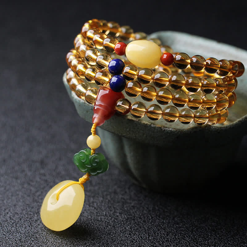 Bracelet Mala 108 perles en citrine et ambre pour la paix