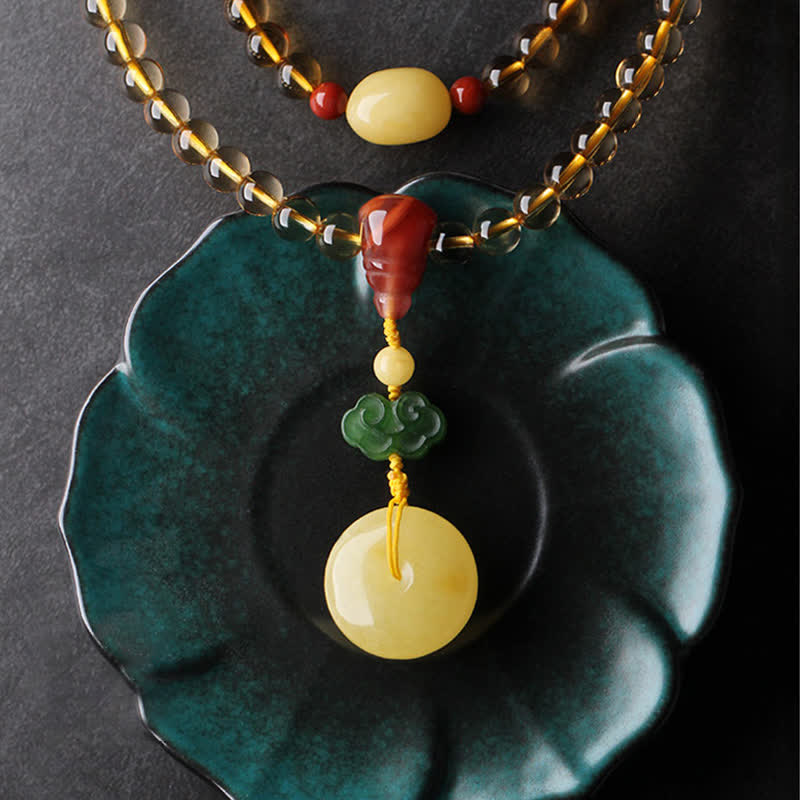 Bracelet Mala 108 perles en citrine et ambre pour la paix