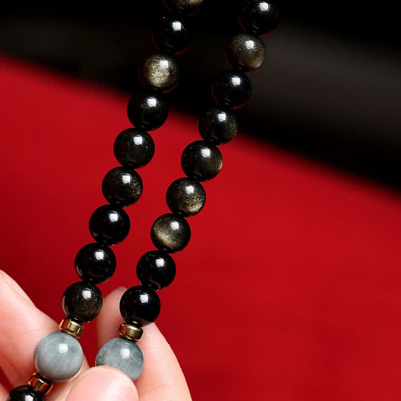 Bracelet de richesse en obsidienne œil-de-tigre à 108 perles dorées et brillantes