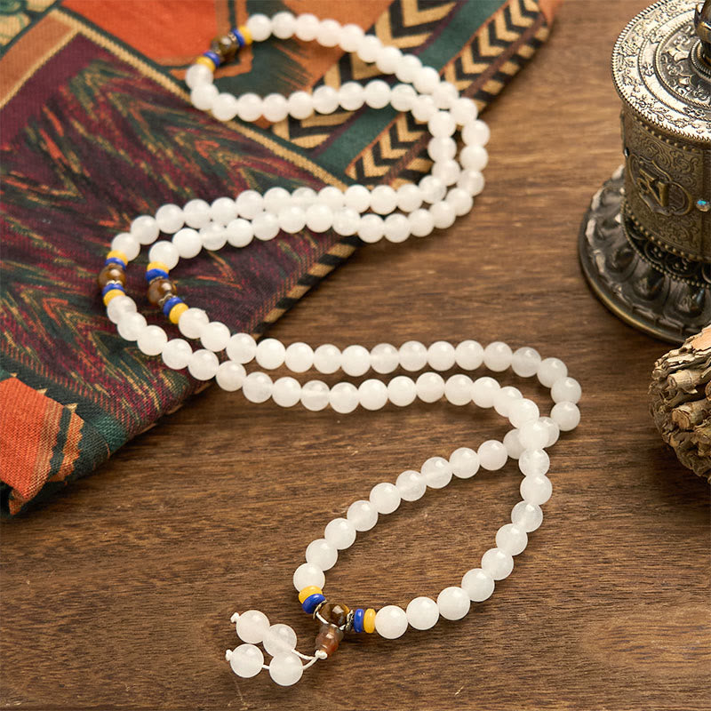 Bracelet Mala en jade et soie dorée à 108 perles pour la richesse et la chance