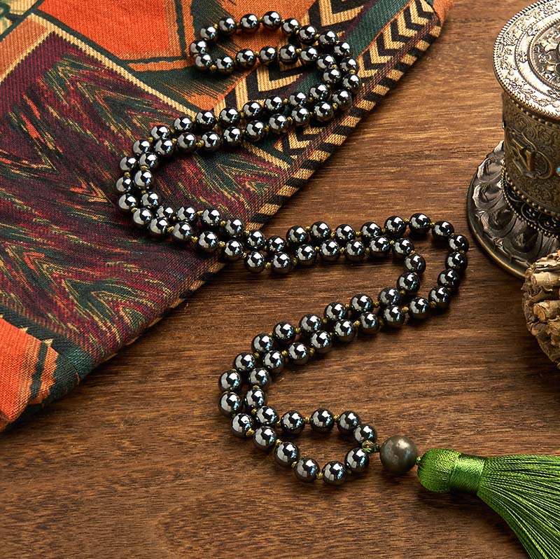 Bracelet de mise à la terre en hématite de 108 perles avec pompon vert