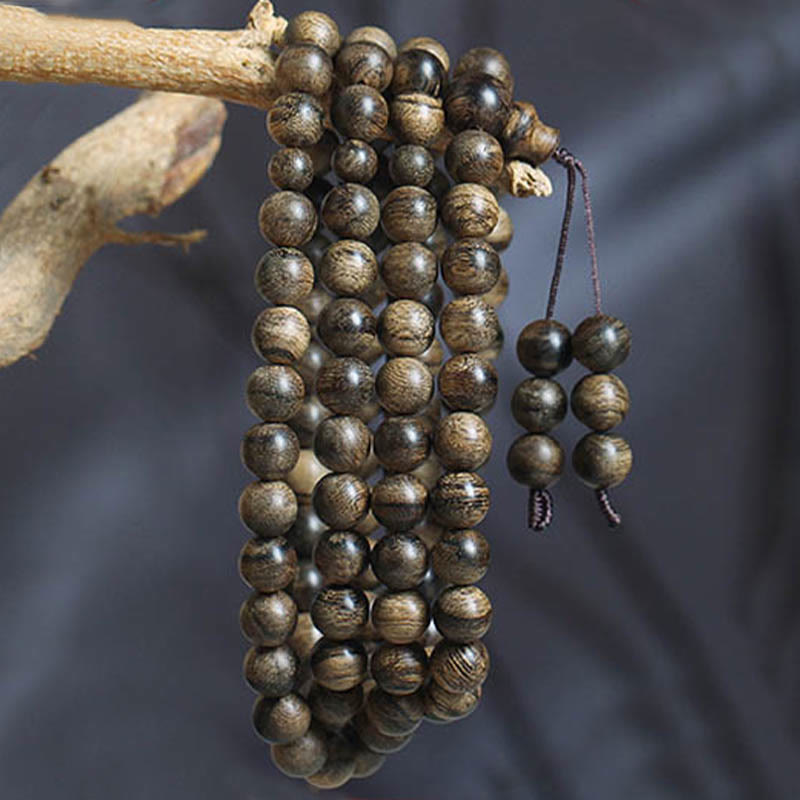 Bracelet Mala en bois d'agar Tarakan de 108 perles pour la protection