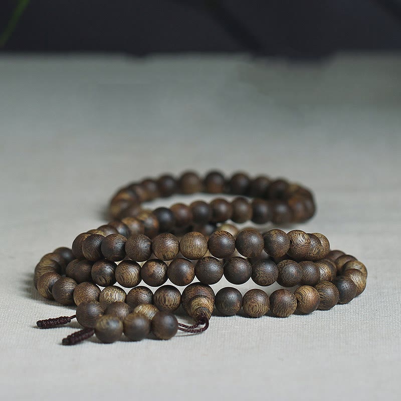 Bracelet Mala en bois d'agar 108 perles pour l'équilibre et la force