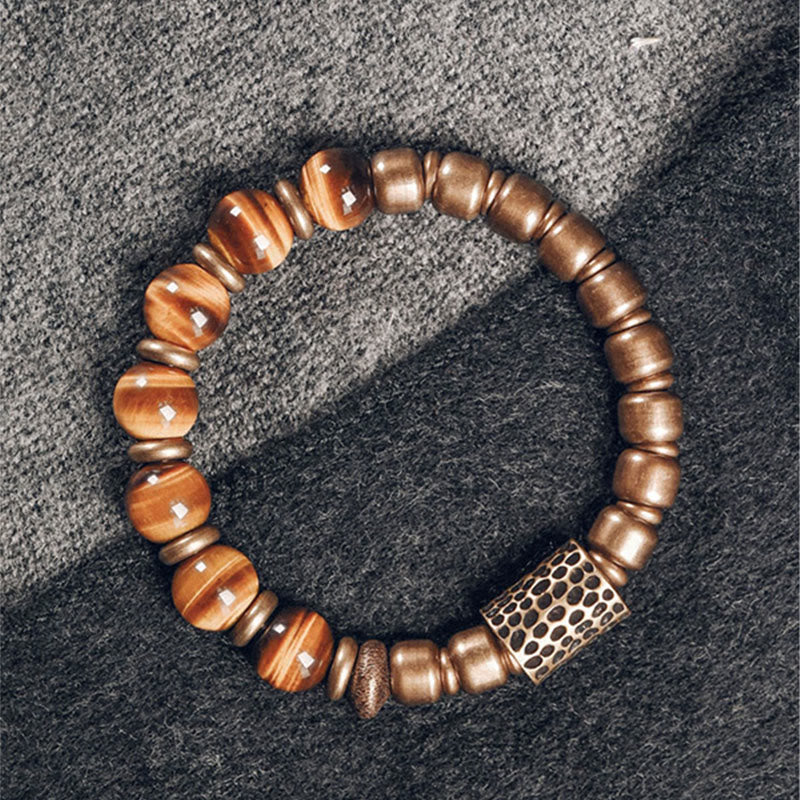 Bracelet de protection œil de tigre 10 mm avec accents cuivrés