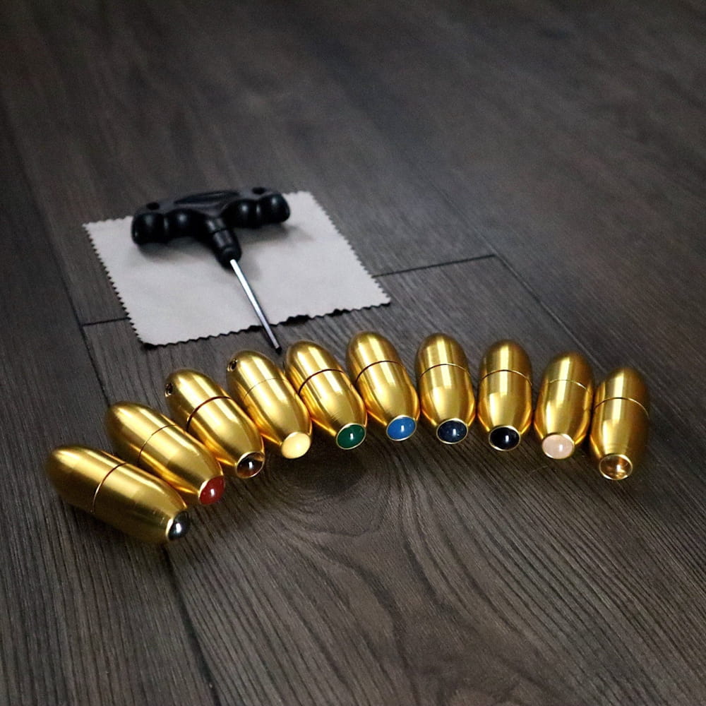Golden bullet-shaped earbuds with colored markings for Crystal Tuning Fork Handles