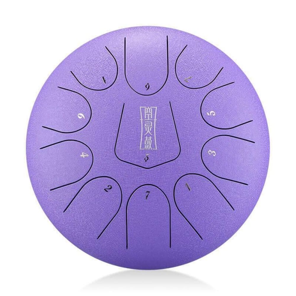 Purple steel tongue drum with 11 tonal sections in F key for relaxing music sessions