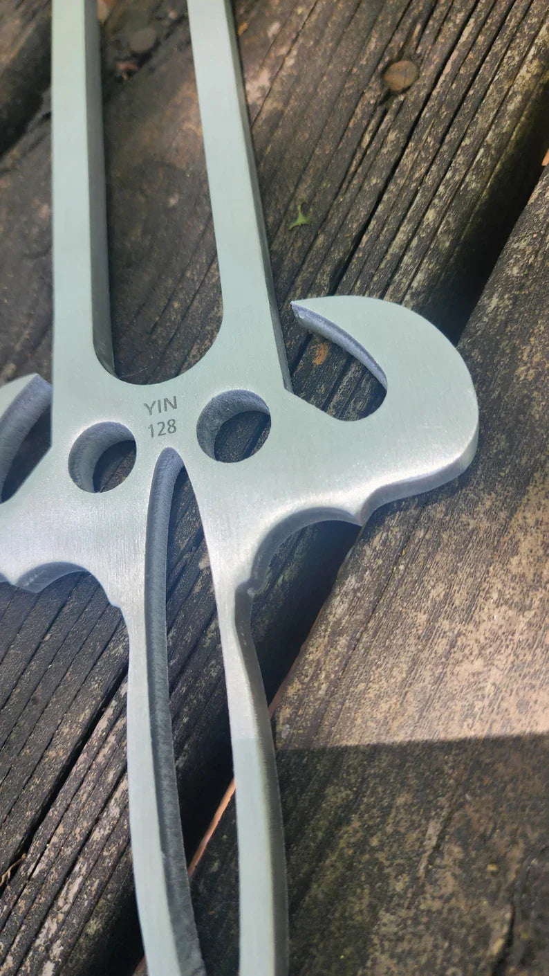 Metal climbing carabiner with X-shaped design for 128 Hz and 192 Hz tuning forks