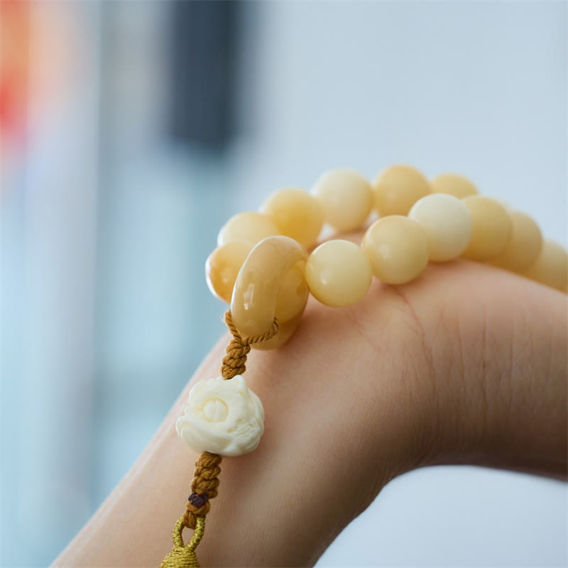 Mala de poignet en graines de Bodhi de 12 mm avec breloque lion dansant pour l'harmonie