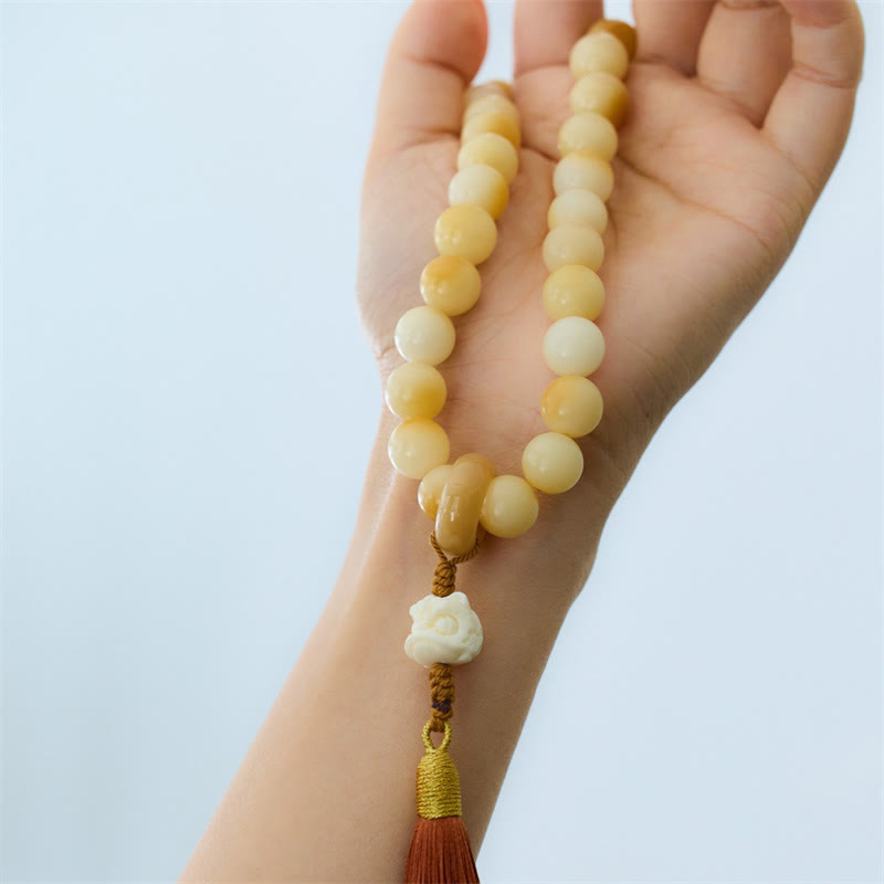 Mala de poignet en graines de Bodhi de 12 mm avec breloque lion dansant pour l'harmonie