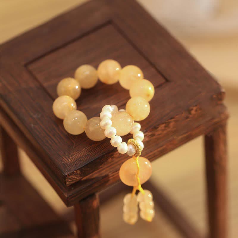 Bracelet en citrine de 12 mm avec boucle de paix pour la prospérité