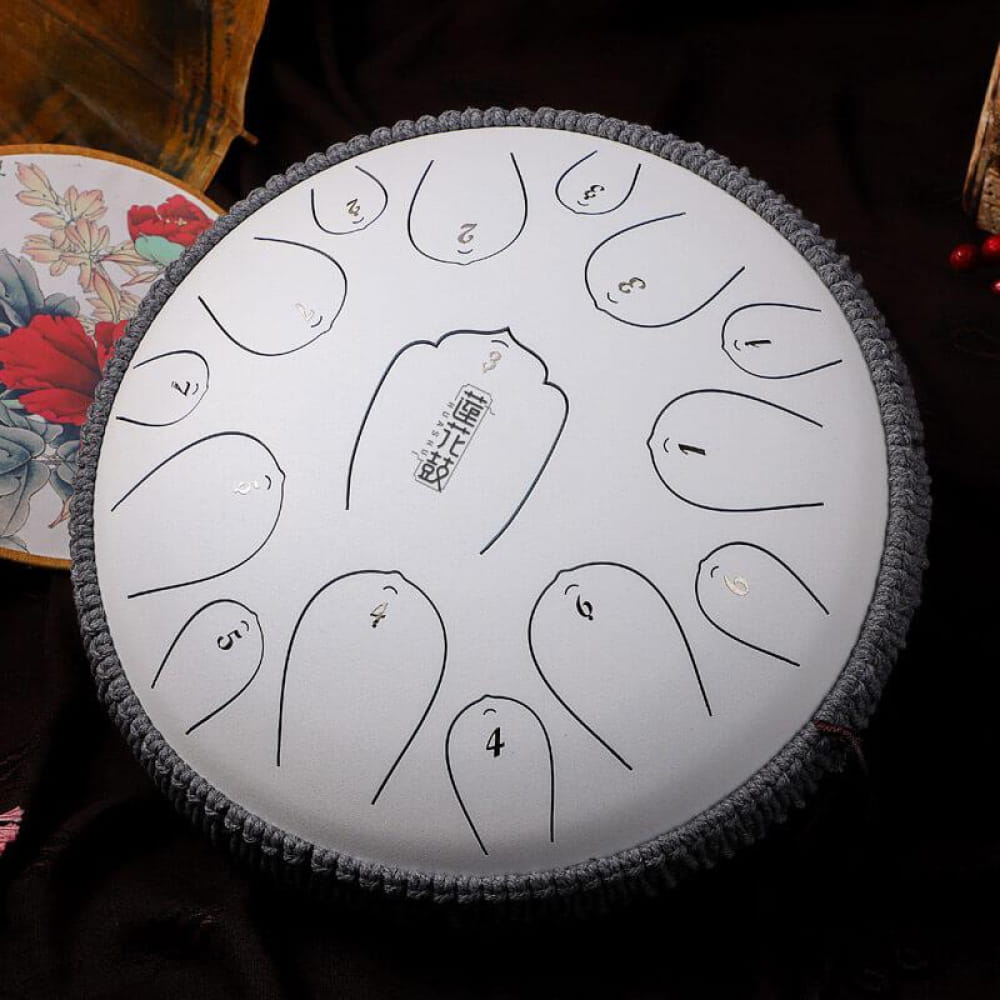 White steel tongue drum with numbered zones in 13-Inch Carbon Steel, 15 Notes in D Key