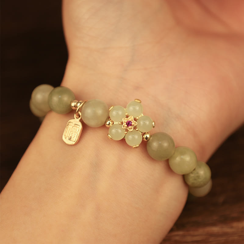 Bracelet porte-bonheur en jade vert avec fleur de 14 à 16 cm