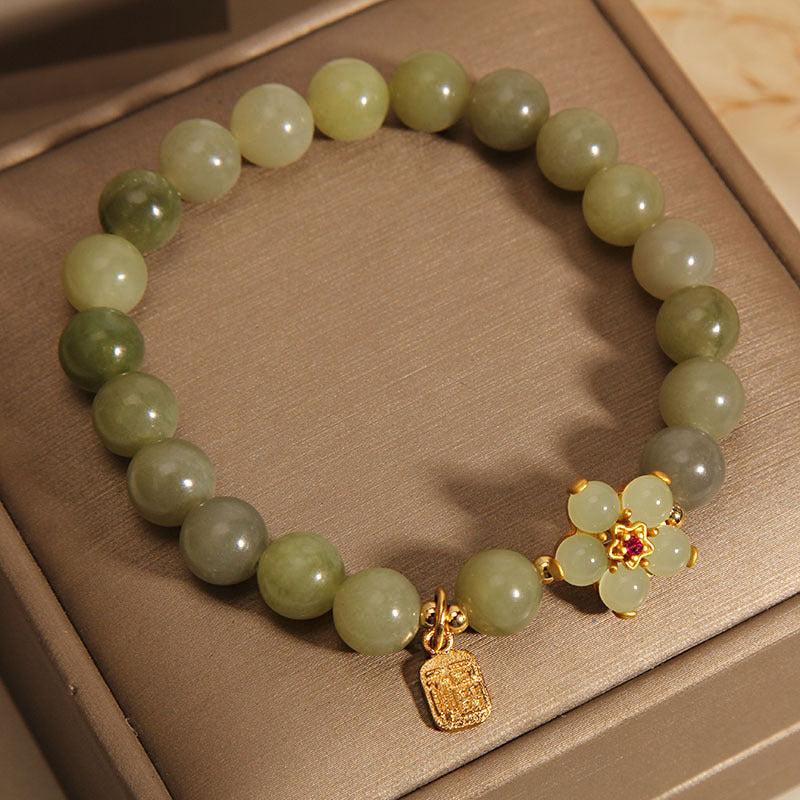 Bracelet porte-bonheur en jade vert avec fleur de 14 à 16 cm