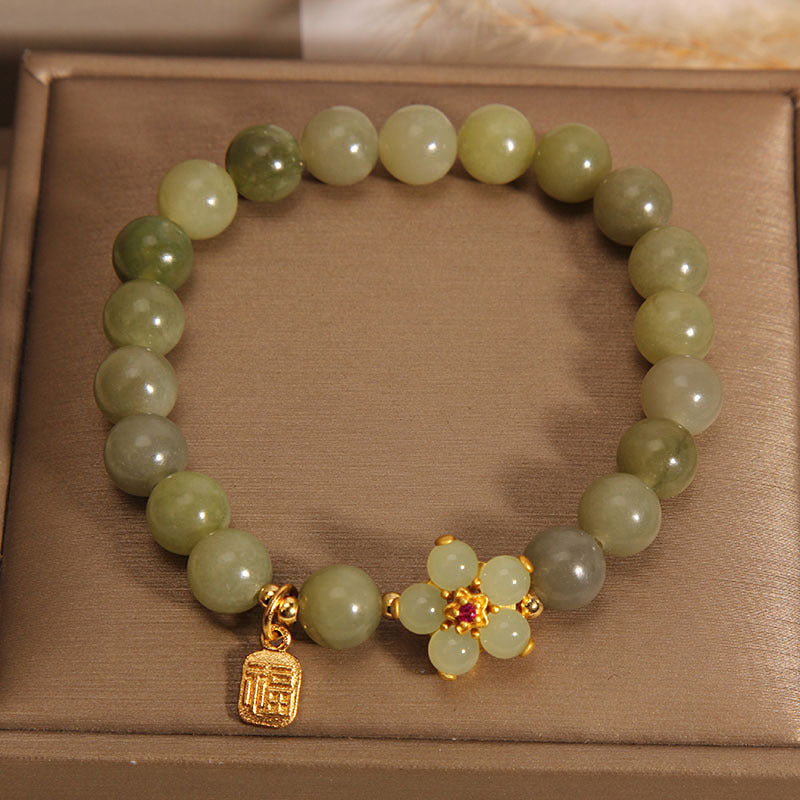 Bracelet porte-bonheur en jade vert avec fleur de 14 à 16 cm