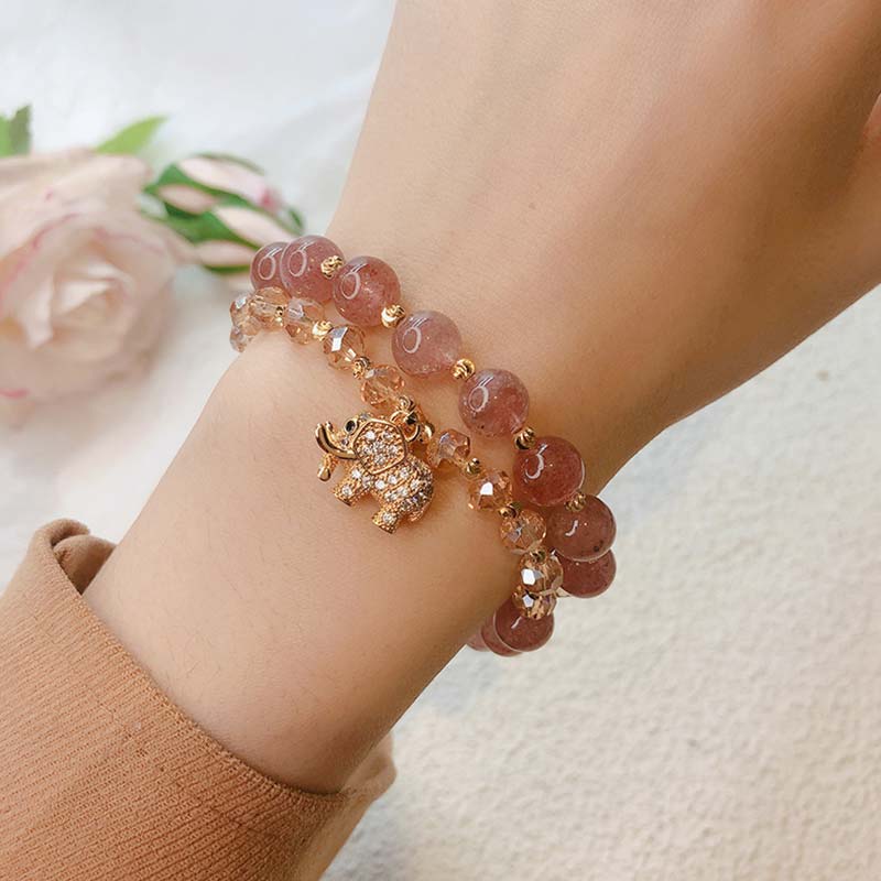 Bracelet à breloques énergétiques de guérison en quartz rose avec éléphant