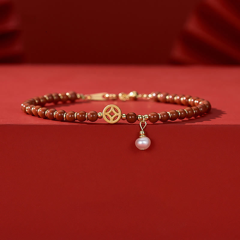 Bracelet de confiance en agate rouge plaqué or 14 carats avec pièce en cuivre
