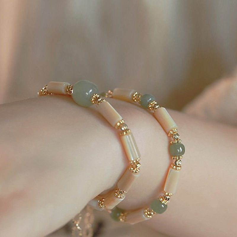 Bracelet en pierre de Tridacna plaqué or 14 carats et jade Hetian en bambou