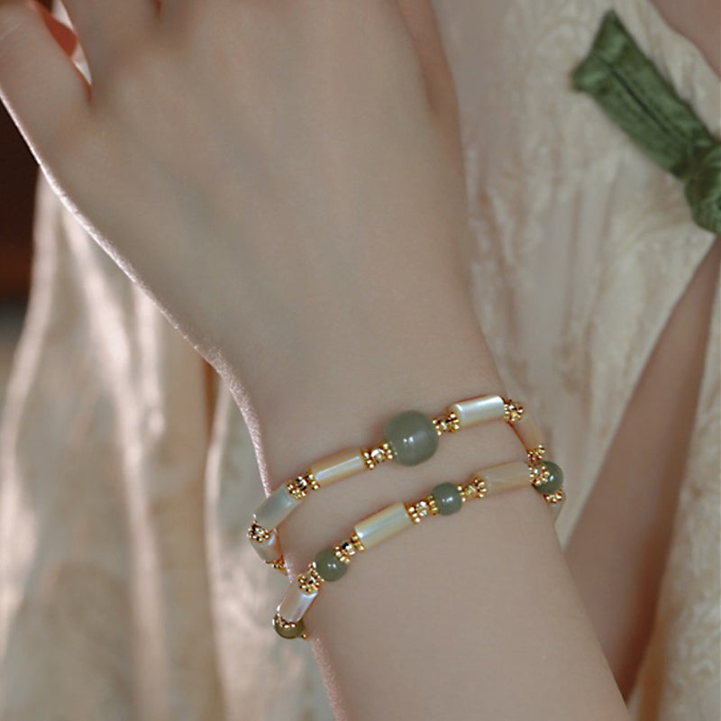 Bracelet en pierre de Tridacna plaqué or 14 carats et jade Hetian en bambou