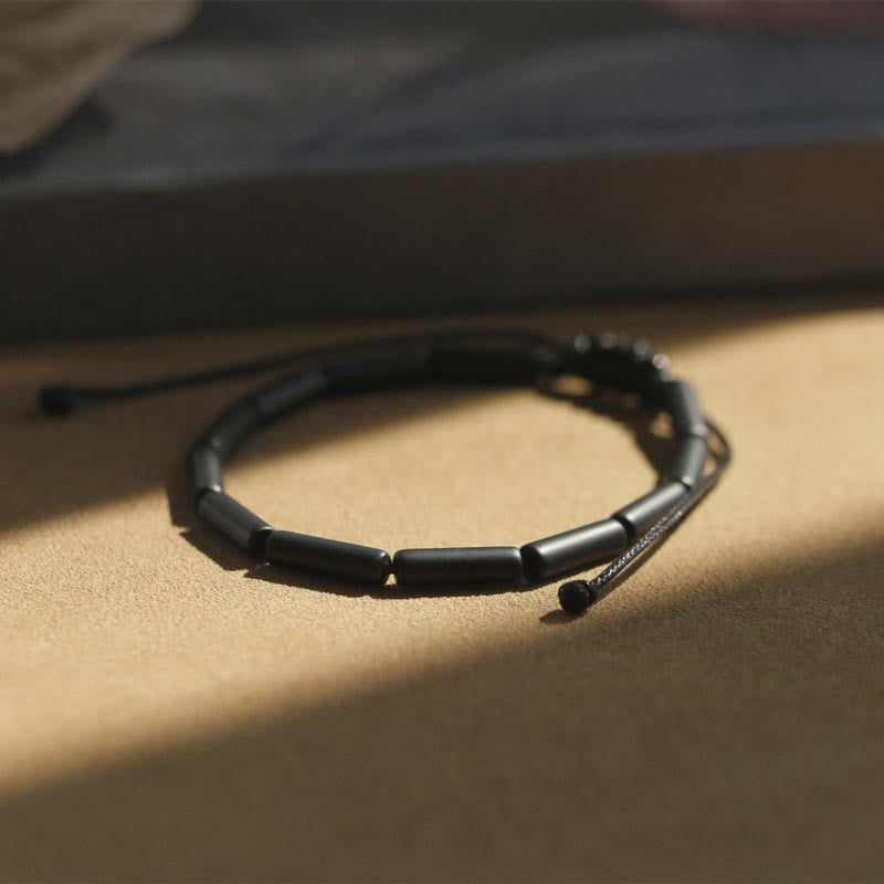 Bracelet en perles d'onyx noir de 14 mm pour le soutien et la protection