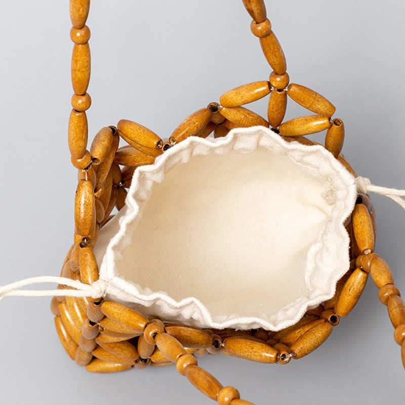 Sac à bijoux spirituel en mini perles de bois tissées à la main