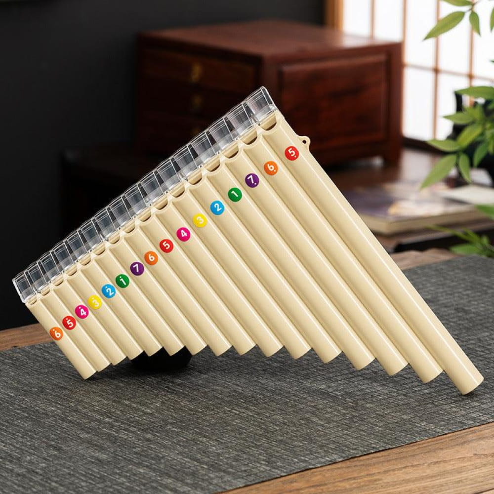 Pan flute with colorful numbered pipes in descending order for beginners