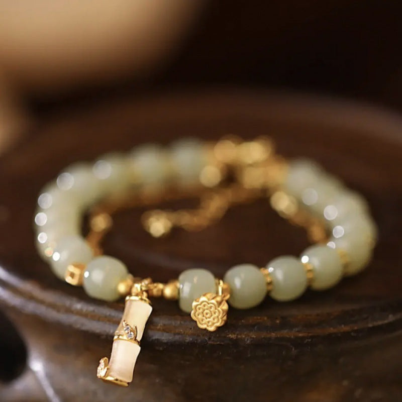 Bracelet à breloques en jade Hetian Lotus pour la prospérité et la croissance