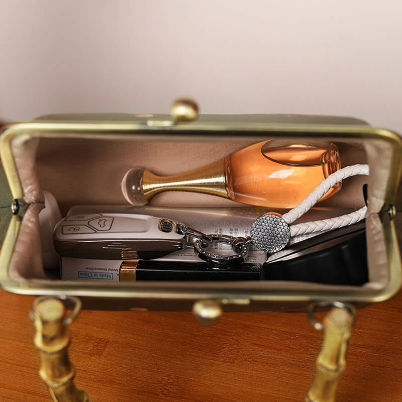 Sac à bandoulière avec poignée en bambou et plantes vertes