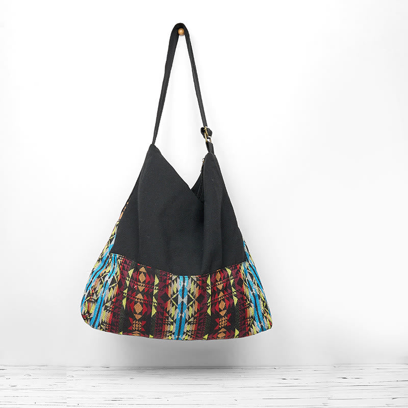 Sac bandoulière en coton à rayures noires, rouges et bleues