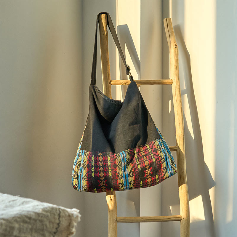 Sac bandoulière en coton à rayures noires, rouges et bleues