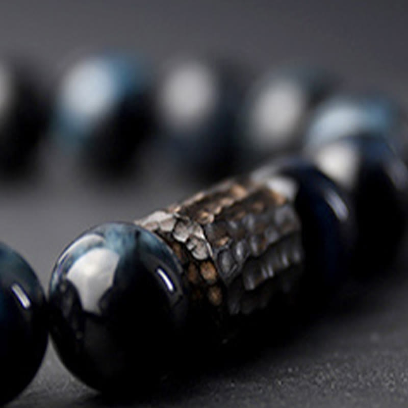 Bracelet de protection en bois d'ébène œil de tigre bleu 10 mm