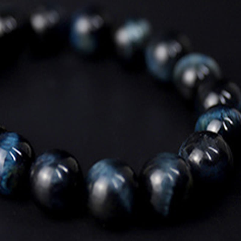 Bracelet de protection en bois d'ébène œil de tigre bleu 10 mm