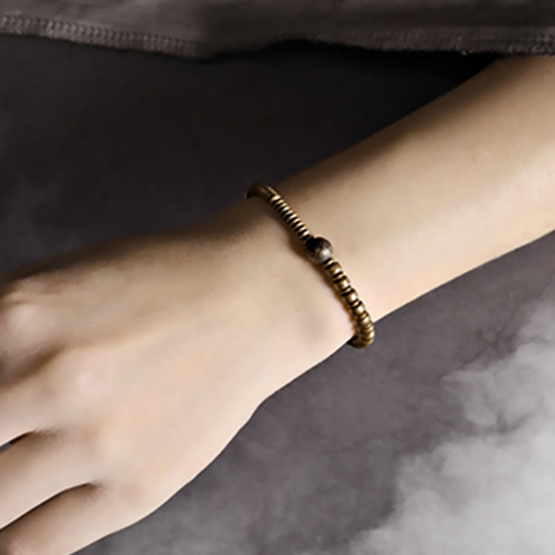 Bracelet spirituel en laiton et cuivre pour l'équilibre et la guérison