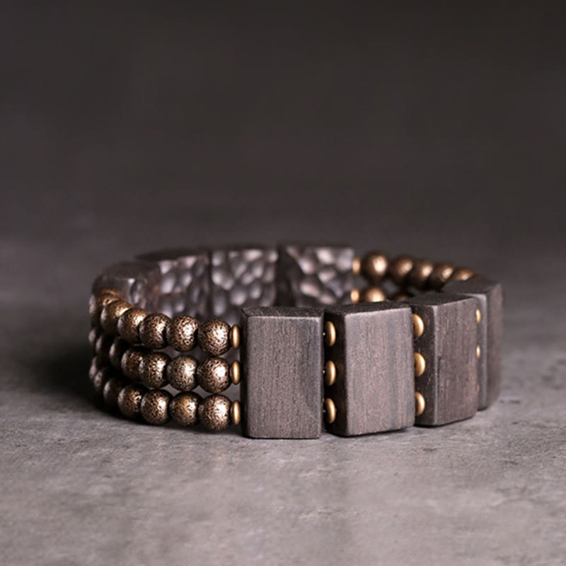 Bracelet d'équilibre vintage en bois d'ébène et perles de cuivre