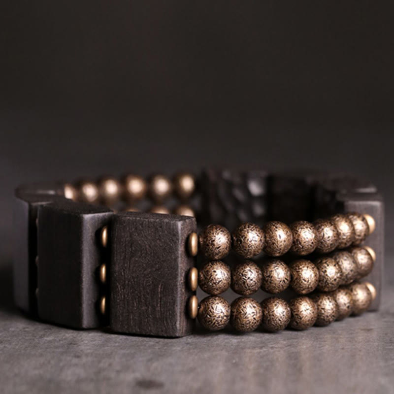 Bracelet d'équilibre vintage en bois d'ébène et perles de cuivre