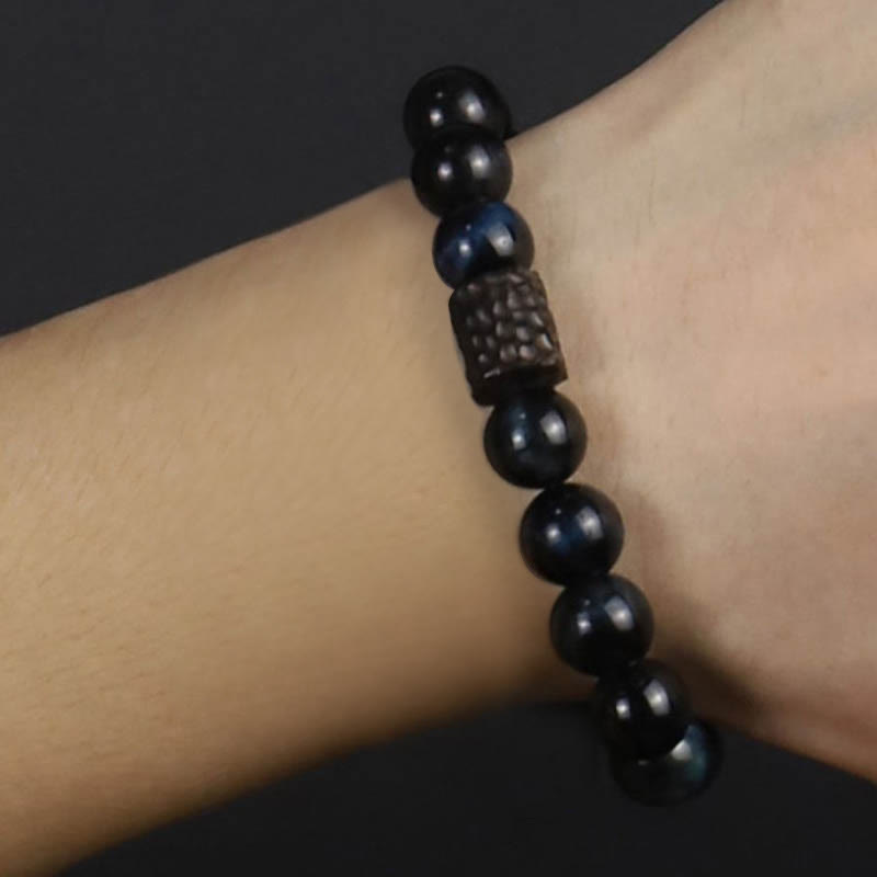Bracelet de protection en bois d'ébène œil de tigre bleu 10 mm