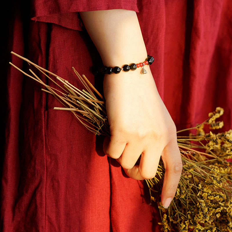 Bracelet de force avec breloque lotus en obsidienne noire de 8 mm