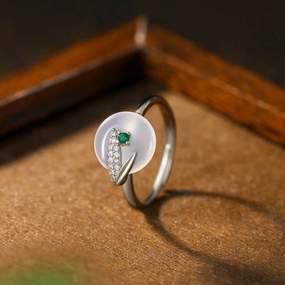 Bague spirituelle réglable positive en calcédoine et feuille de bambou