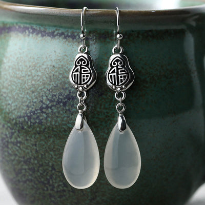 Boucles d'oreilles spirituelles en calcédoine 52 mm avec caractère Fu et harmonie positive