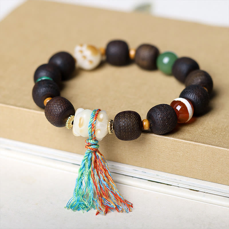 Bracelet de paix en bois d'agar de 12 mm avec breloque en graine de Bodhi