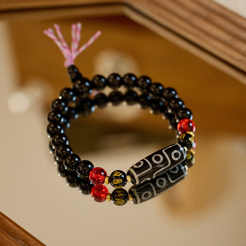 Bracelet de protection spirituelle en onyx noir et perle Dzi à neuf yeux (8 mm)