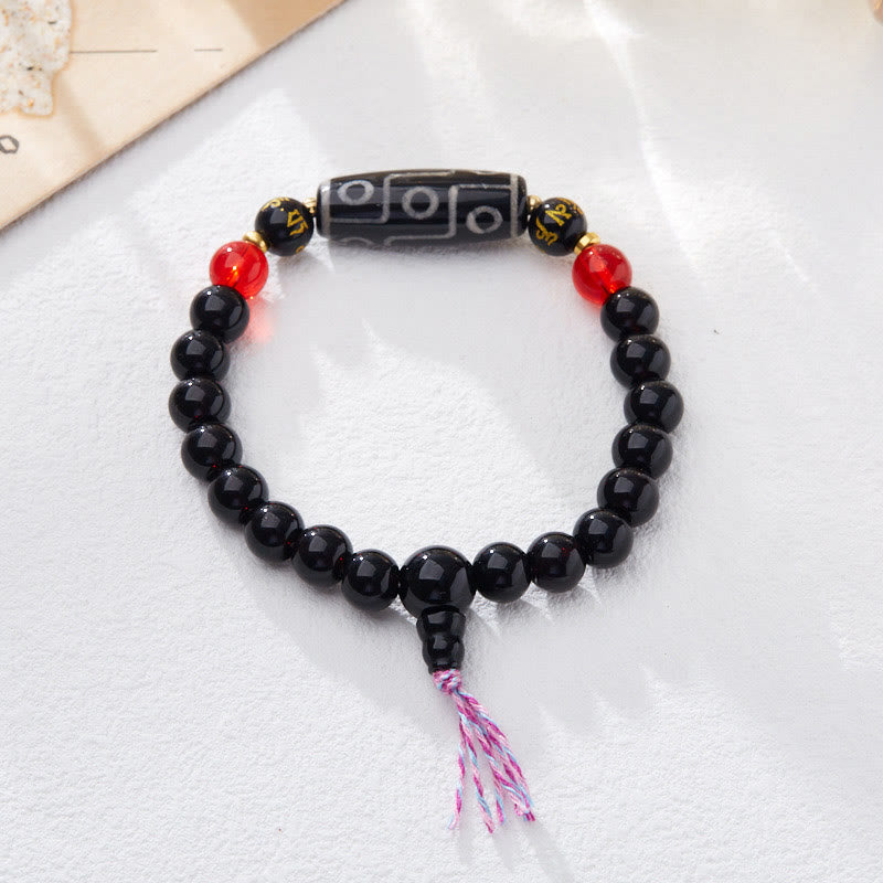 Bracelet de protection spirituelle en onyx noir et perle Dzi à neuf yeux (8 mm)